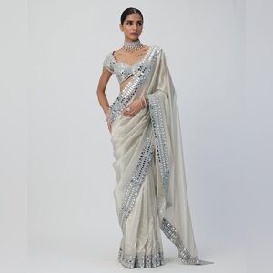 Elegant white with silver mirror work saree in silk fabric (full stitched)